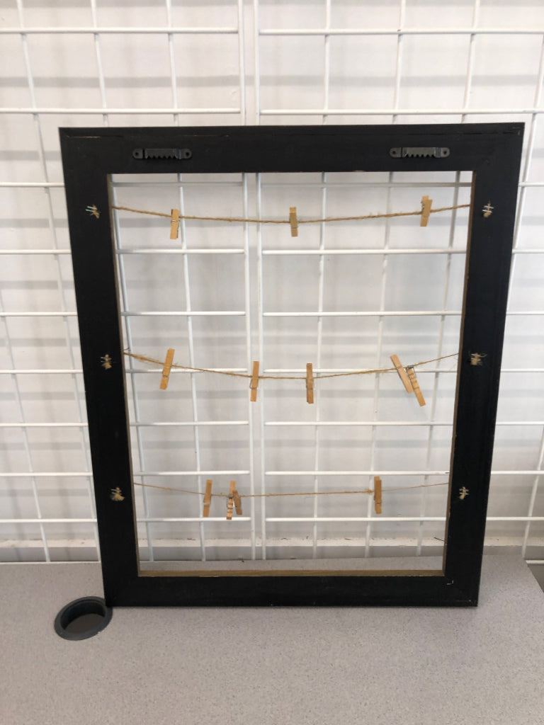 RUSTIC CLOTHES-PIN PHOTO HOLDER.