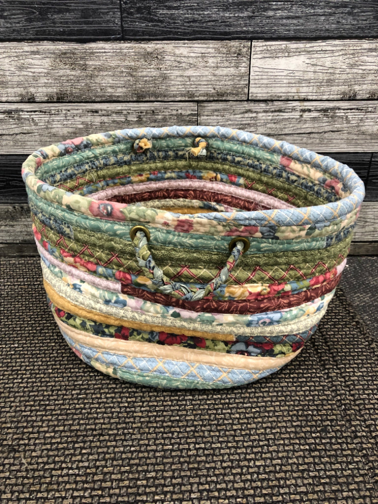 QUILTED STRIPED FABRIC BASKET.
