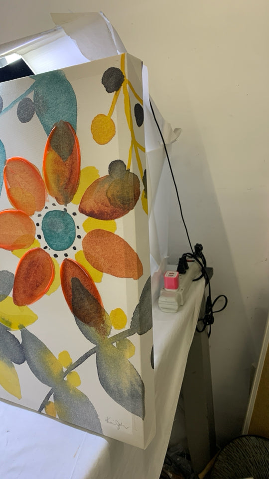 ORANGE AND YELLOW FLORAL CANVAS WALL ART.