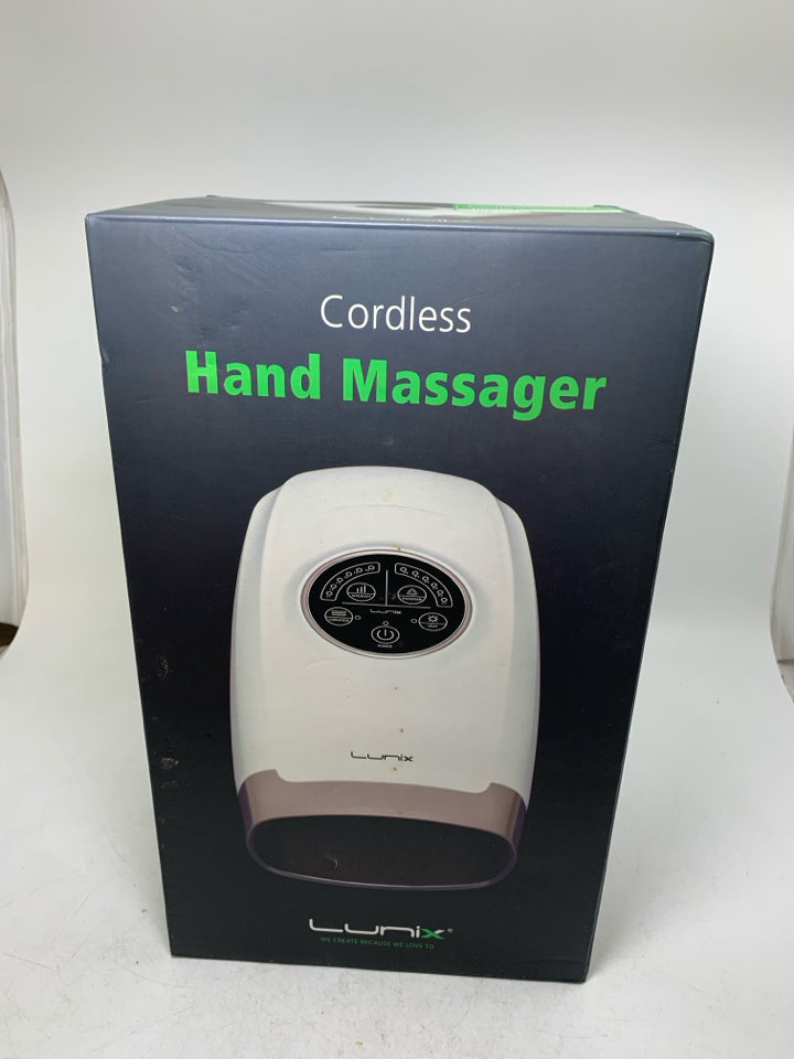 NIB LUNIX CORDLESS HAND MASSAGER.