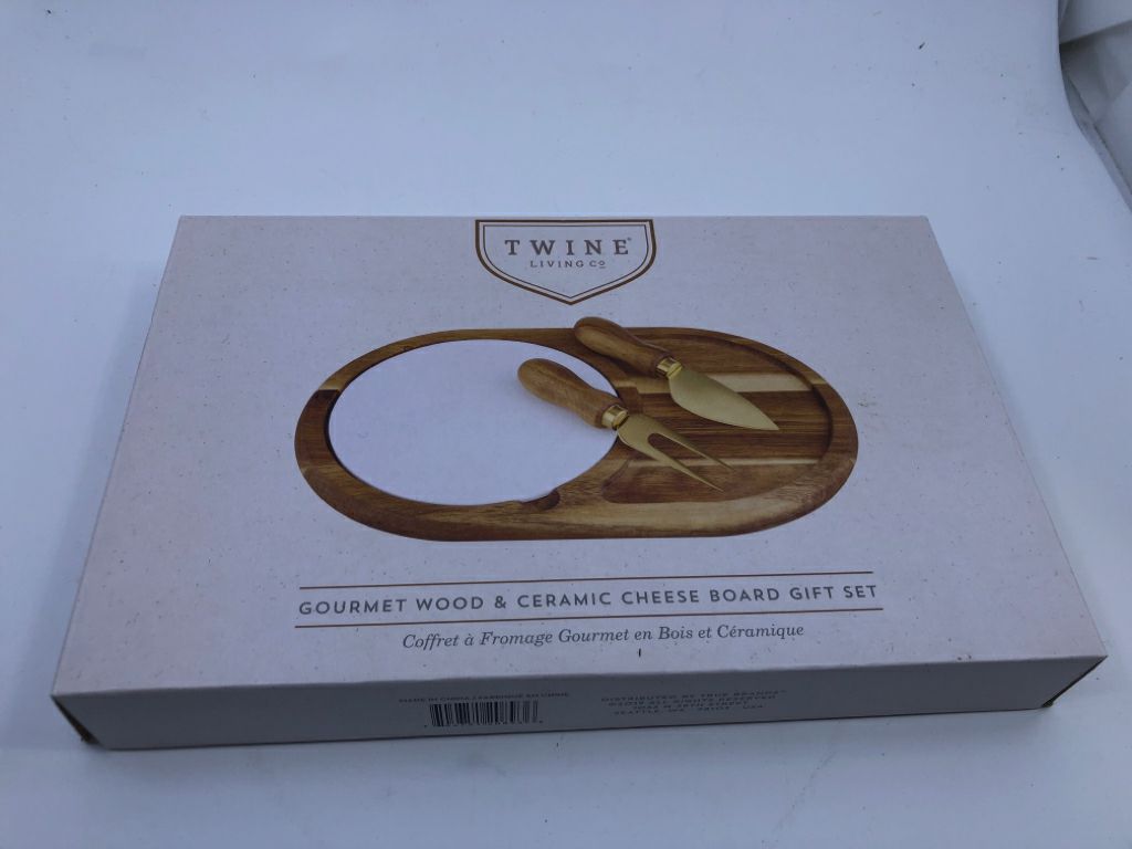 NIB WOOD AND CERAMIC CHEESE BOARD SET.