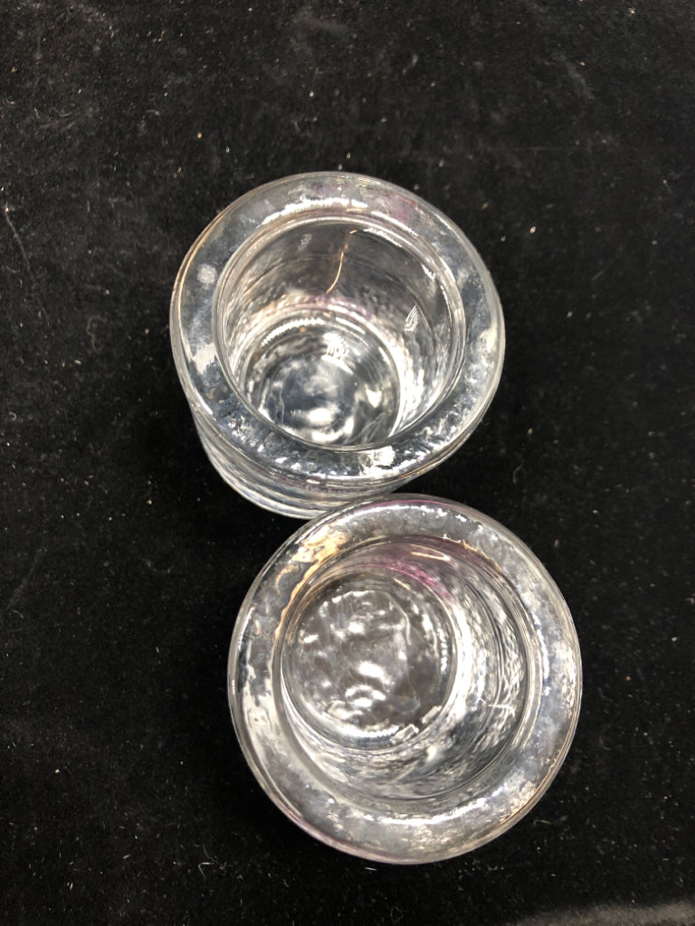 2PC CLEAR VOTIVE HOLDERS.
