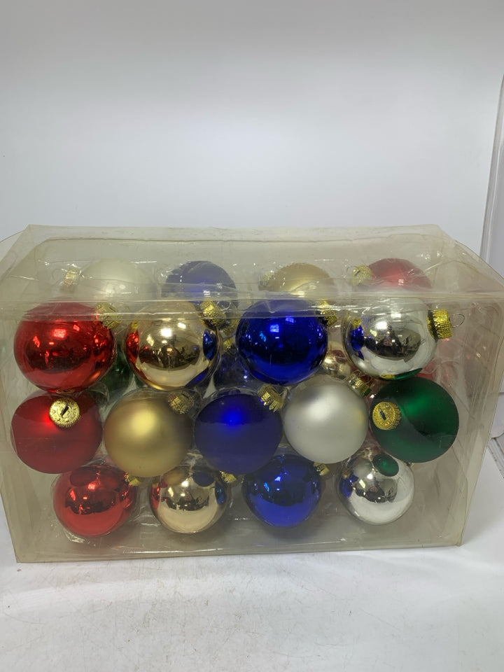 IN BOX 26 ASSORTED COLORS GLASS ORNAMENTS.