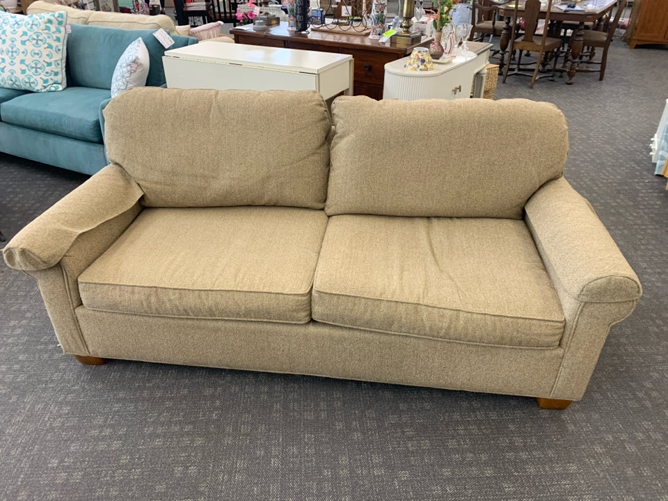 TAN LOVE SEAT.