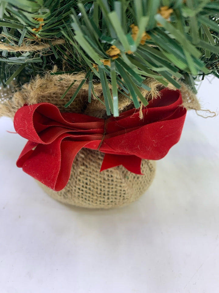 MINI FAUX XMAS TREE W/BURLAP BASE.