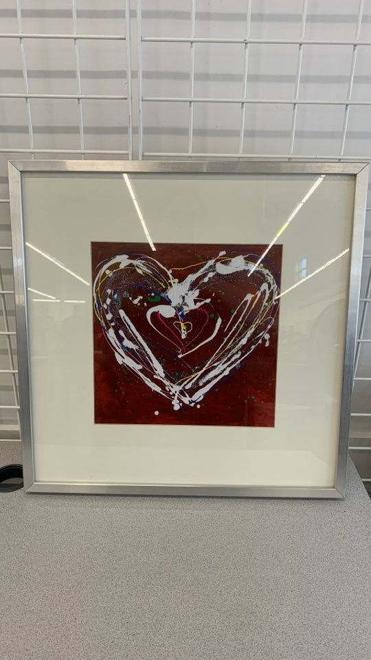 RED SPLATTER PAINT HEART IN SILVER FRAME.