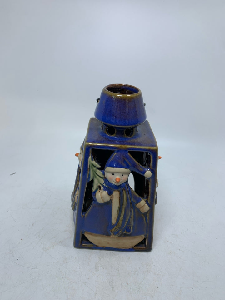BLUE GLAZED PIERCED LANTERN W/ EMBOSSED SNOWMEN TEALIGHT HOLDER.