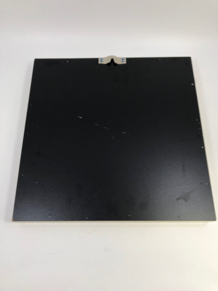 WHITE FLOWER IN GREY SHADOWBOX FRAME.