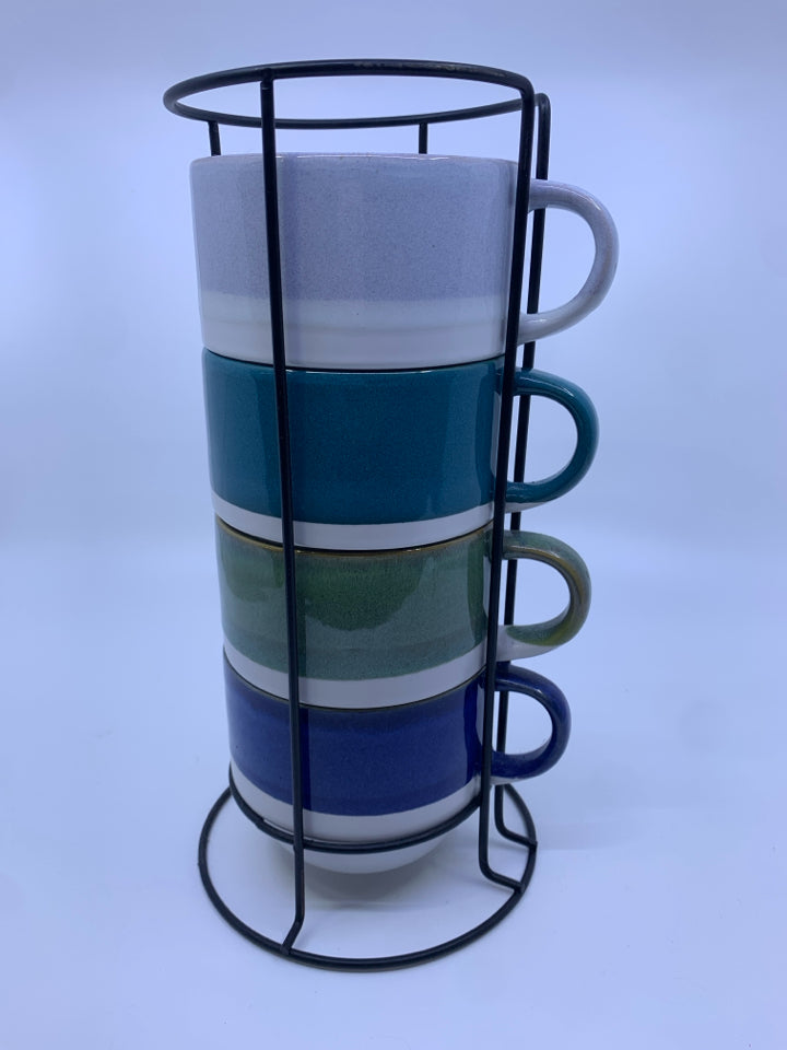 4 WIDE STACKABLE MUGS IN MUG STAND.