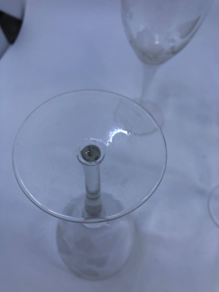 4 LIGHT WHITE ETCHED FLORAL WINE GLASSES.