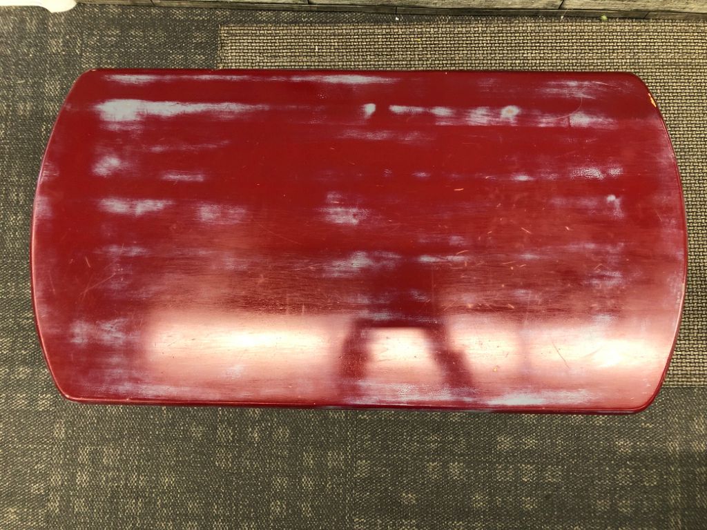 MAROON DISTRESSED COFFEE TABLE.