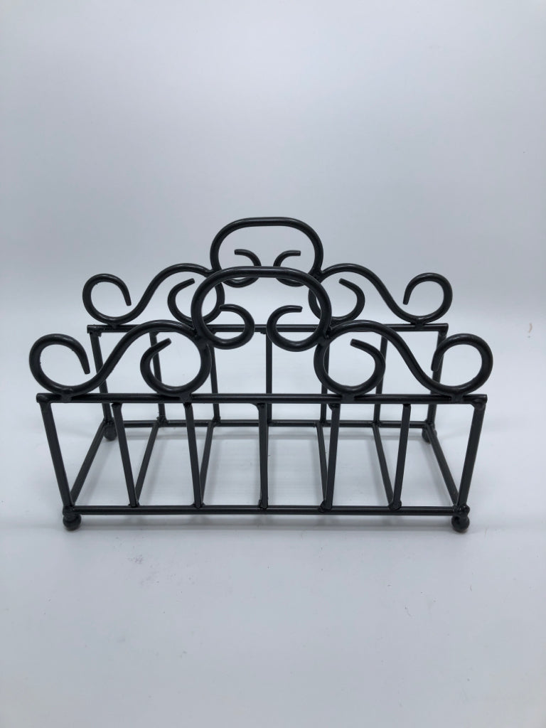 METAL SCROLL NAPKIN HOLDER.