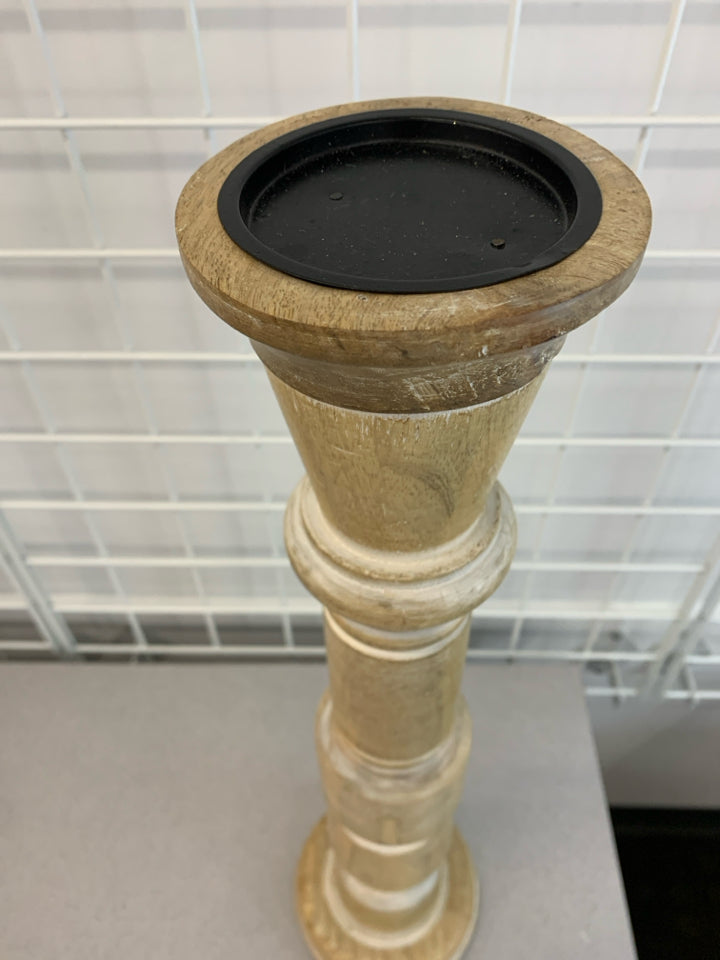 TALL WOODEN CANDLESTICK HOLDER.