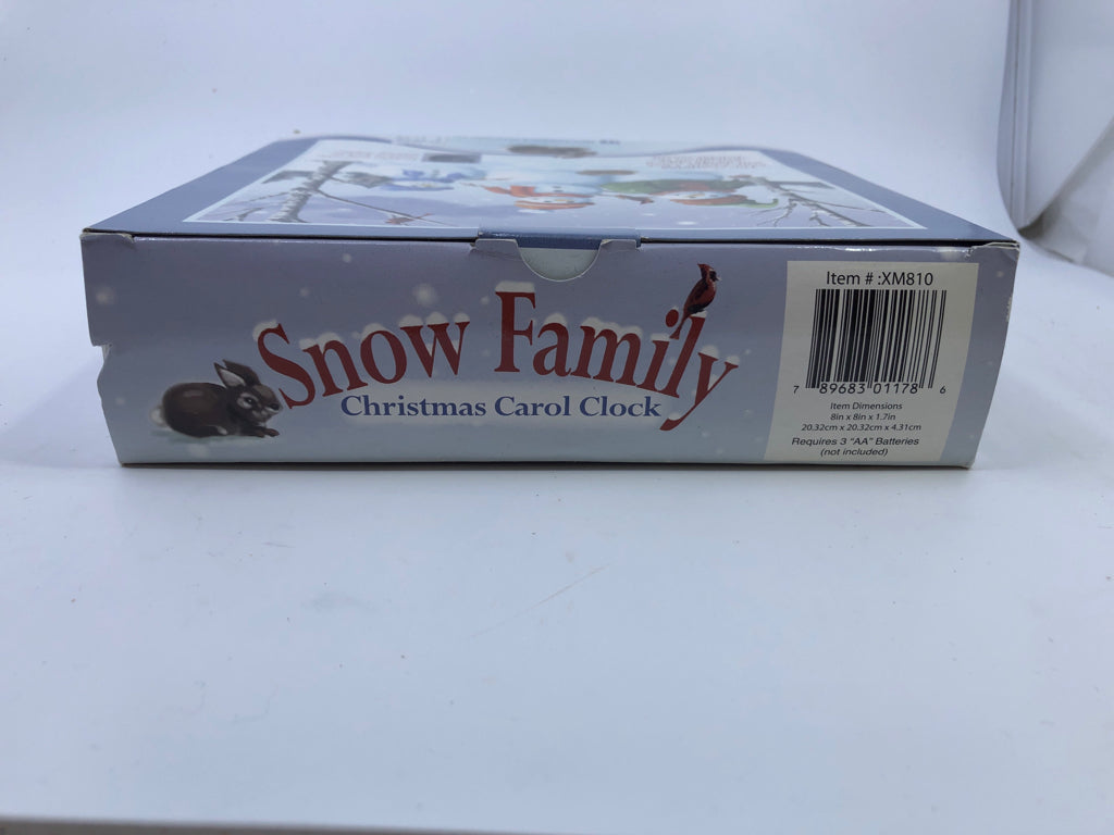 NIB SNOW FAMILY CHRISTMAS CAROL CLOCK.