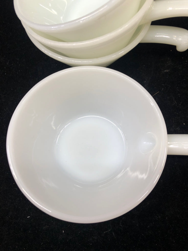 4 VTG MILK GLASS SOUP BOWLS W/ SIDE HANDLES.