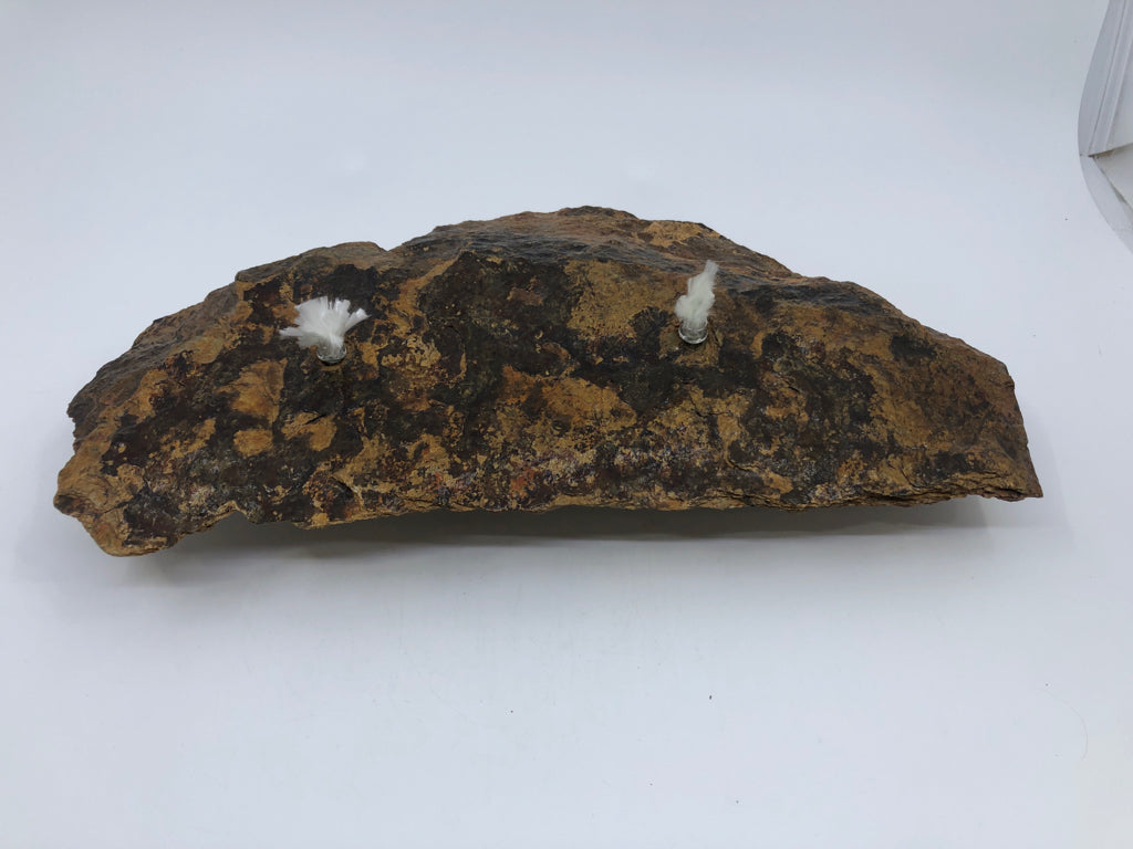 TWO TONED ROCK SLAB W/ 2 OIL LAMPS.