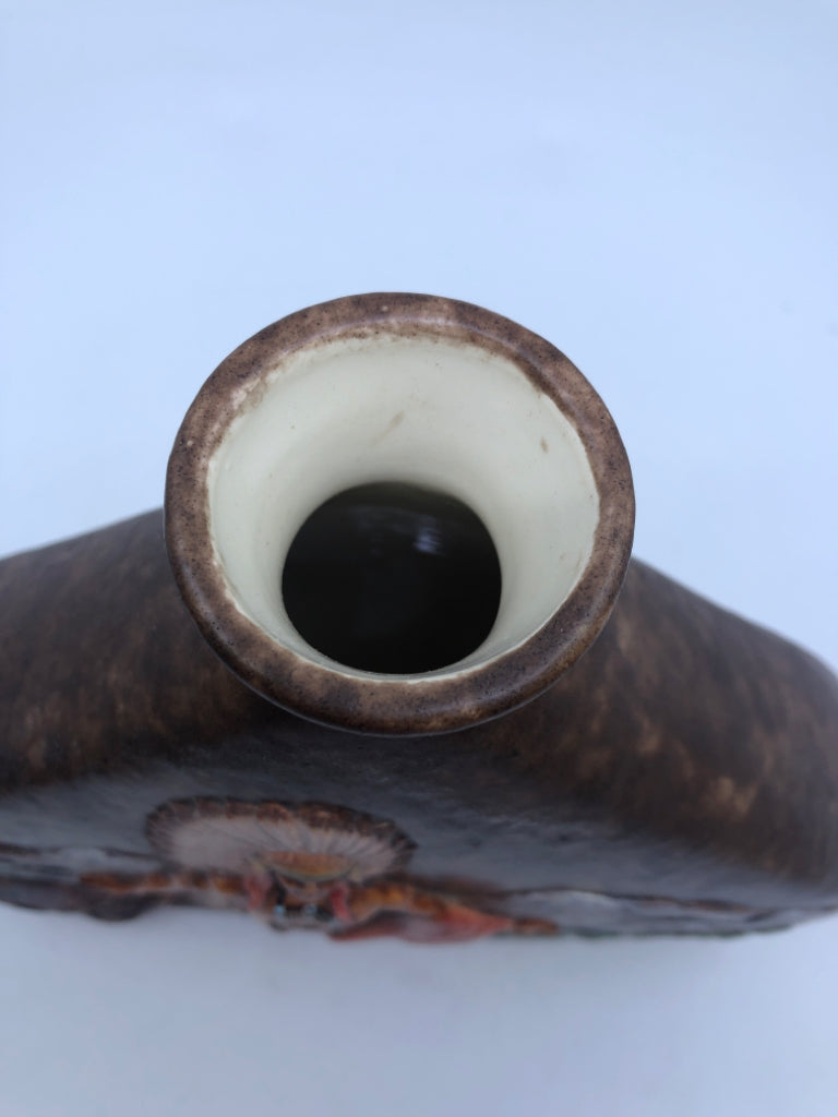 WIDE CERAMIC EMBOSSED INDIGENOUS MAN DECANTER W STOPPER.