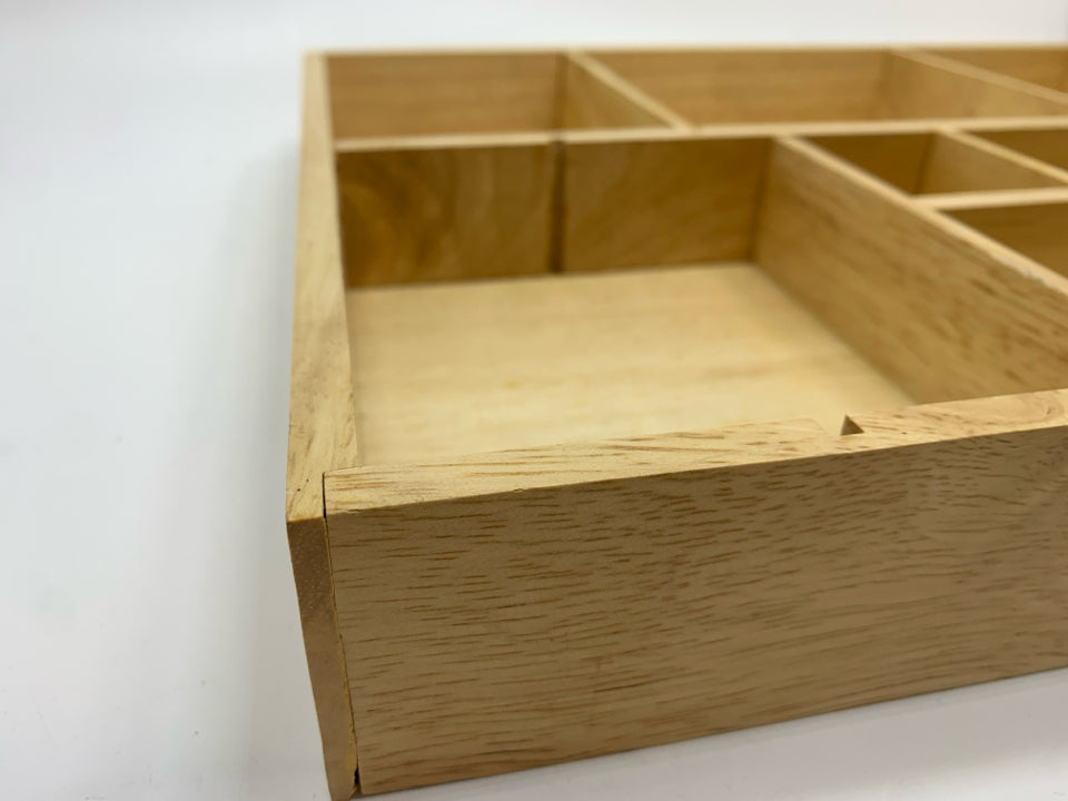 DIVIDED WOODEN UTENSIL STORAGE.