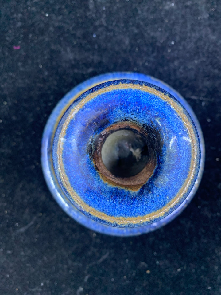 BLUE POTTERY TAPER CANDLE HOLDER.