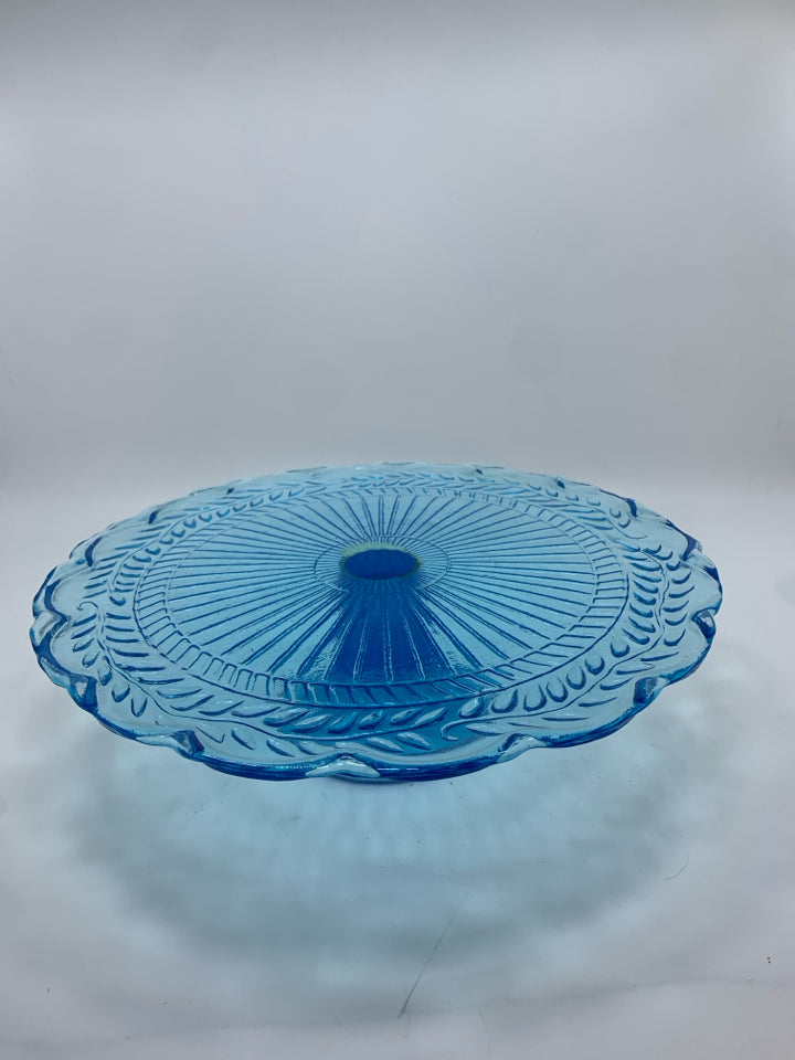 BLUE GLASS CAKE PLATE W/EMBOSSED LEAVES AND RUFFLE EDGE.