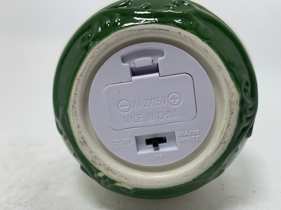 CIRCLE PIERCED LIGHT UP CERAMIC ORNAMENT.