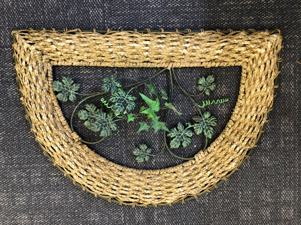 GREEN IVY AND WICKER WALL HANGING.