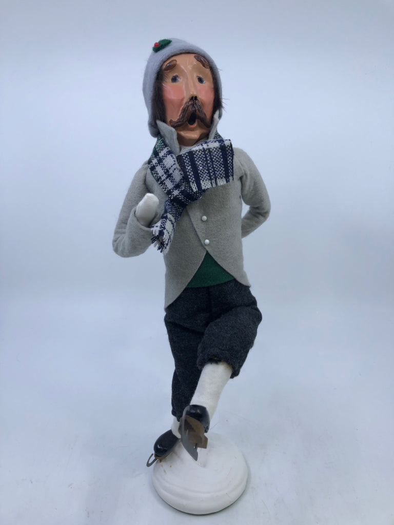 MAN IN GREY COAT W/BLUE & WHITE PLAID SCARF "THE SKATERS" 1991 BYERS' CHOICE.