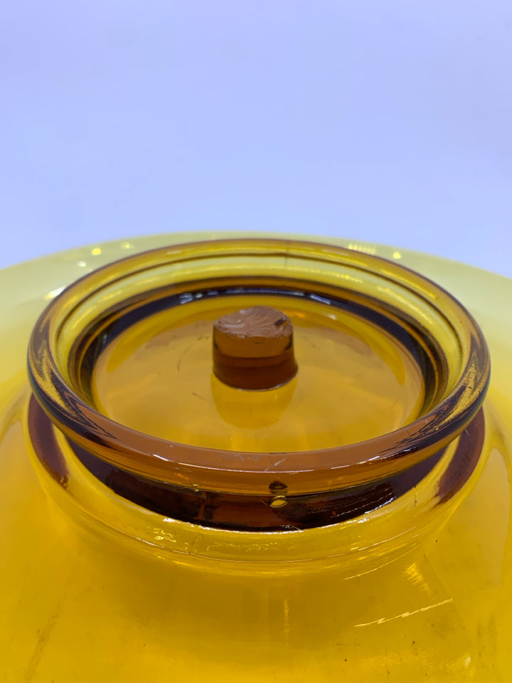 AMBER GLASS FOLDED EDGE BOWL.