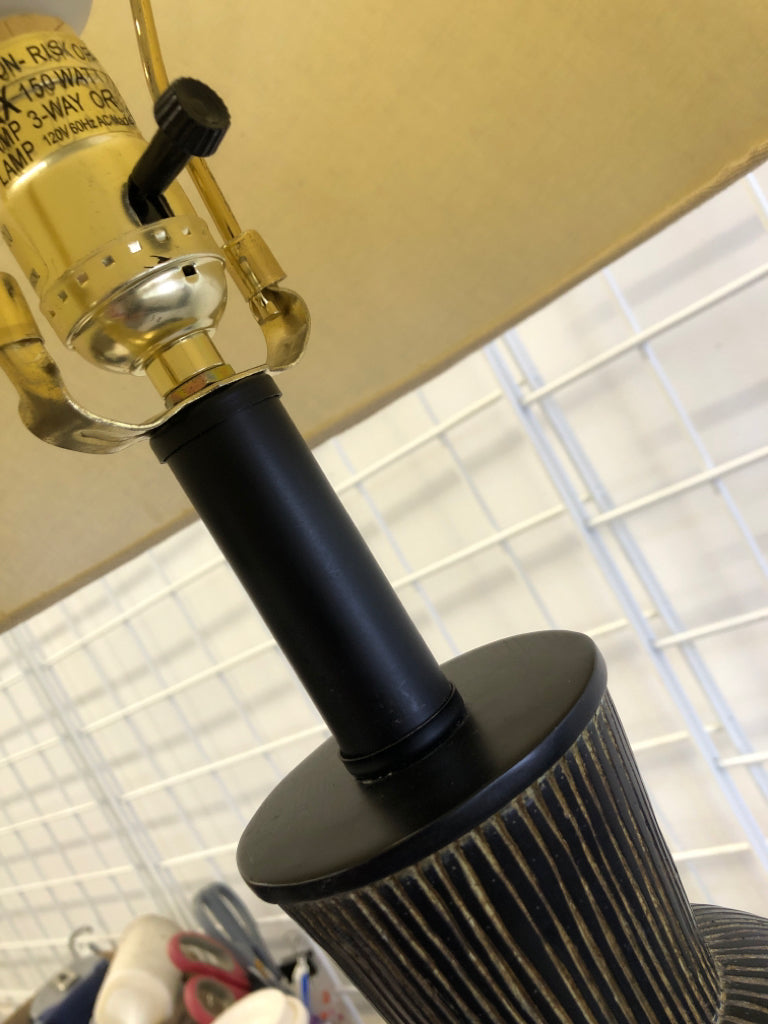 DARK WOOD LAMP ETCHED W/BEIGE SHADE.