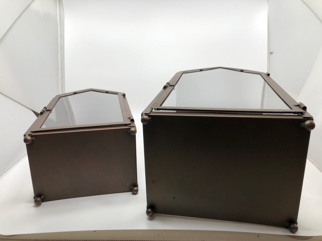 2 BROWN METAL CANDLE LANTERNS.