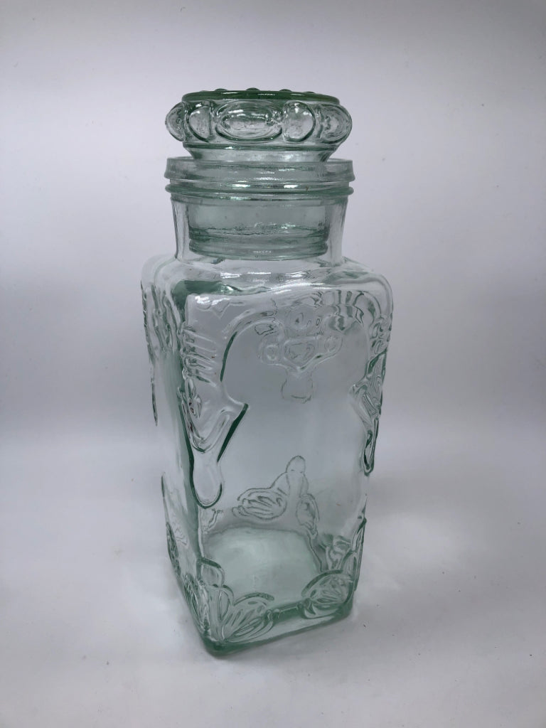 ORNATE EMBOSSED GREEN GLASS CANISTER W/LID.