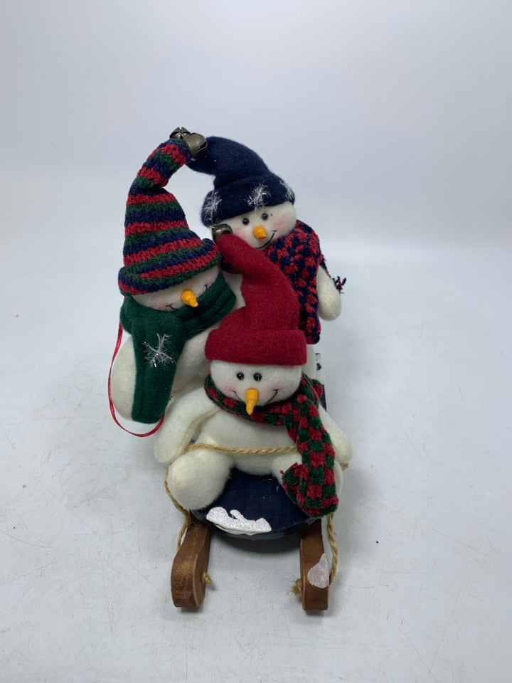 3 PLUSH SNOWMEN ON SLED SMALL.