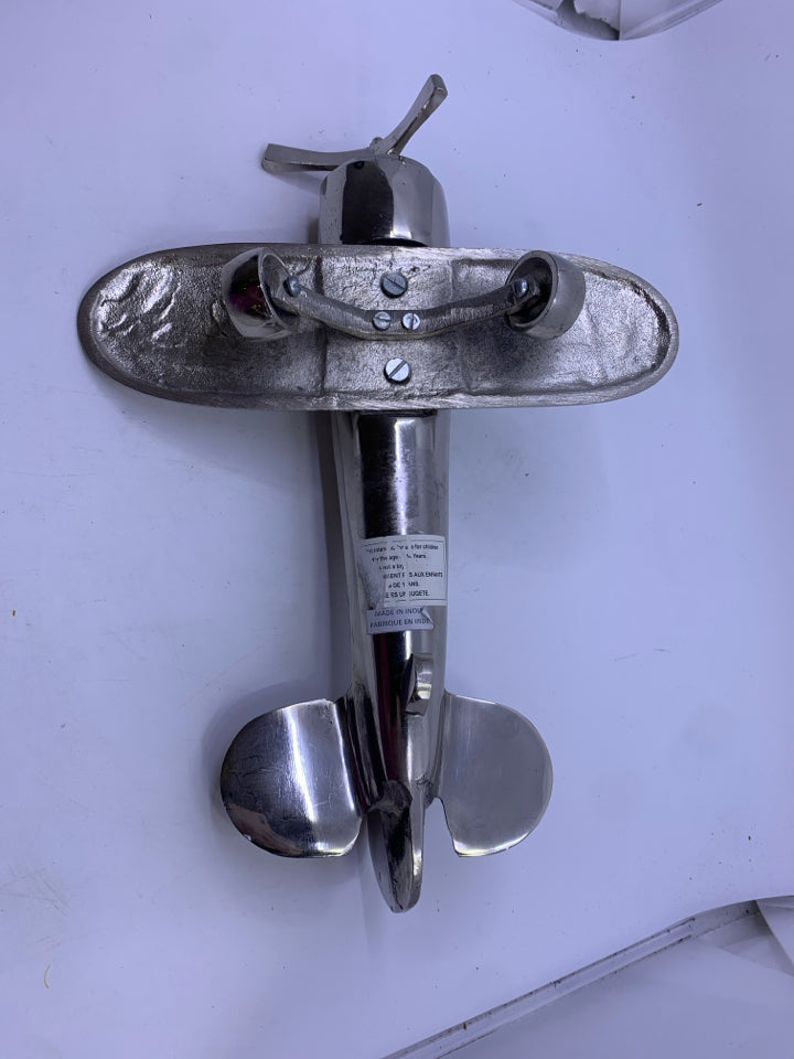 FOOTED MATTE SILVER METAL AIRPLANE W/ 3 PROPELLERS.