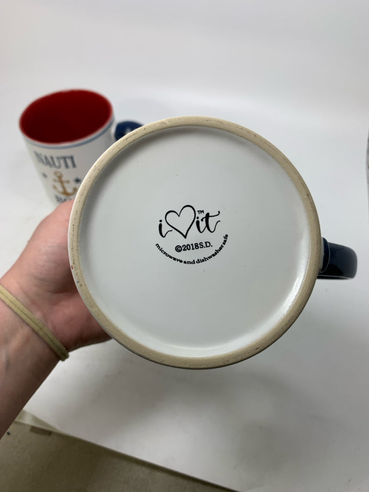 2 LARGE NAUTI BOY/GIRL MUGS.