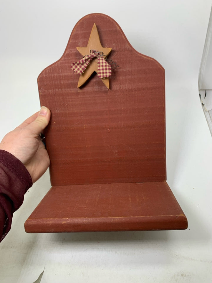 WOOD SHELF W/ EMBOSSED STAR.