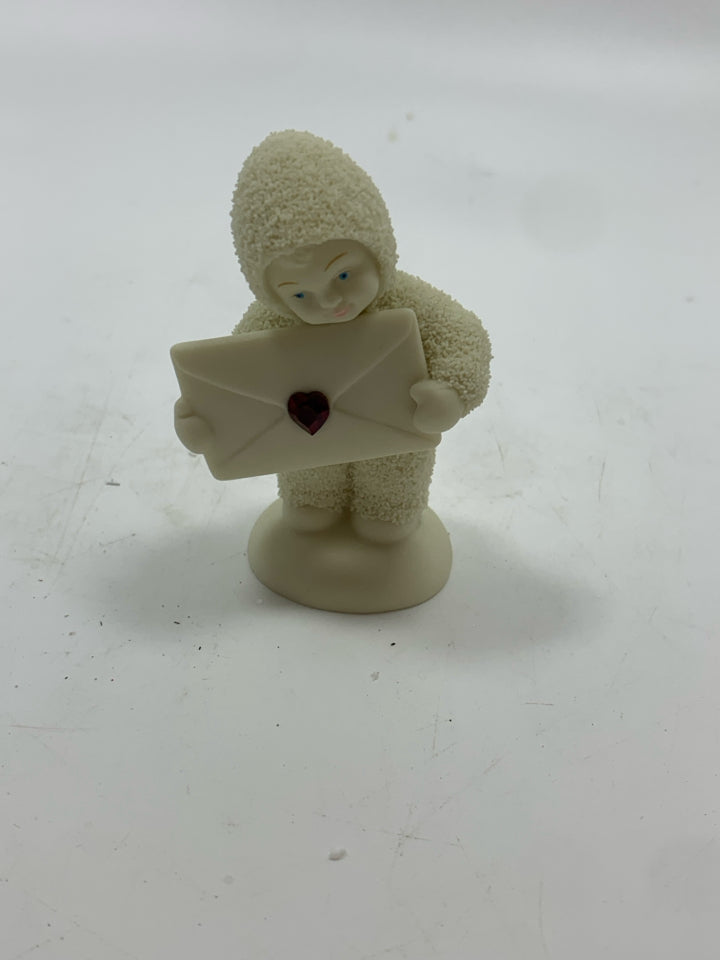 SMALL SNOWBABY HOLDING ENVELOPE W/ RED HEART.