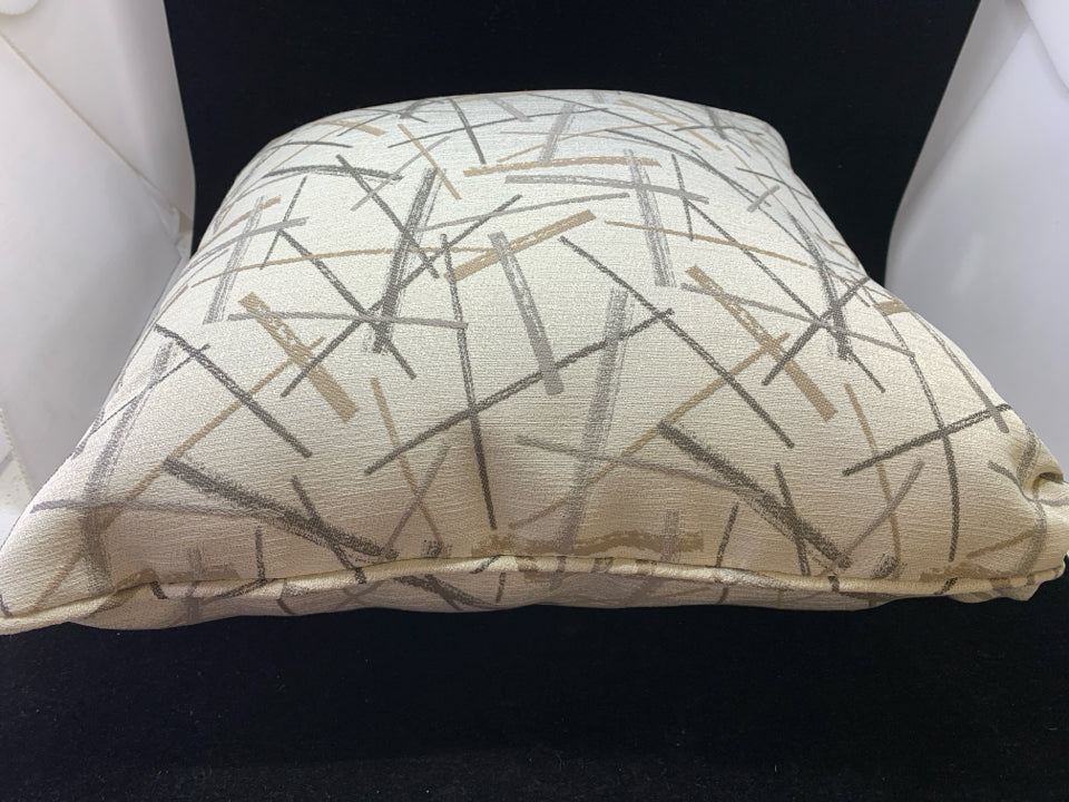CREAM PILLOW W/GOLD, SILVER LINES.