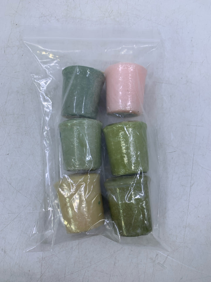 6 ASSORTED TEA LIGHT CANDLES IN BAG.