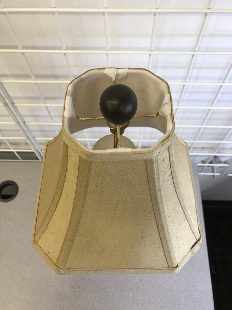 HEAVY METAL SCROLL BLACK BASE LAMP W CREAM SHADE.