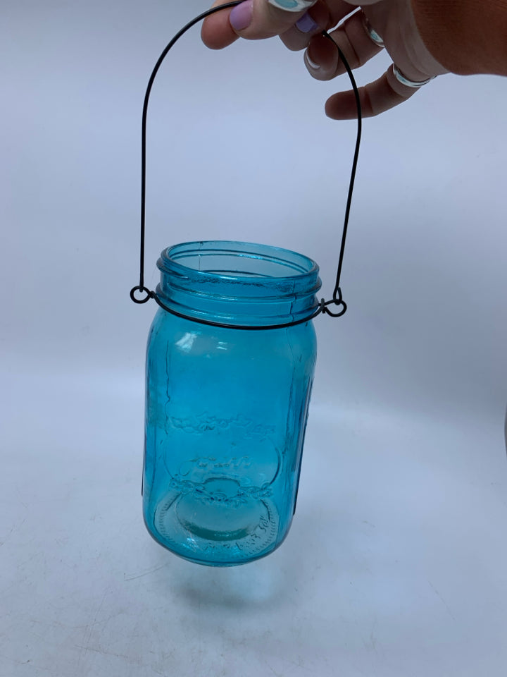 BLUE GLASS MASON JAR W/ BLCK HANDLE.