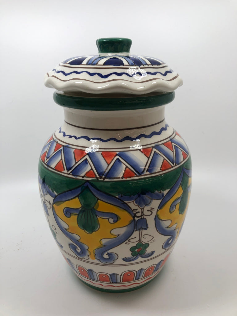 MULTI-COLORED BLUE/ YELLOW ROUNDED JAR.