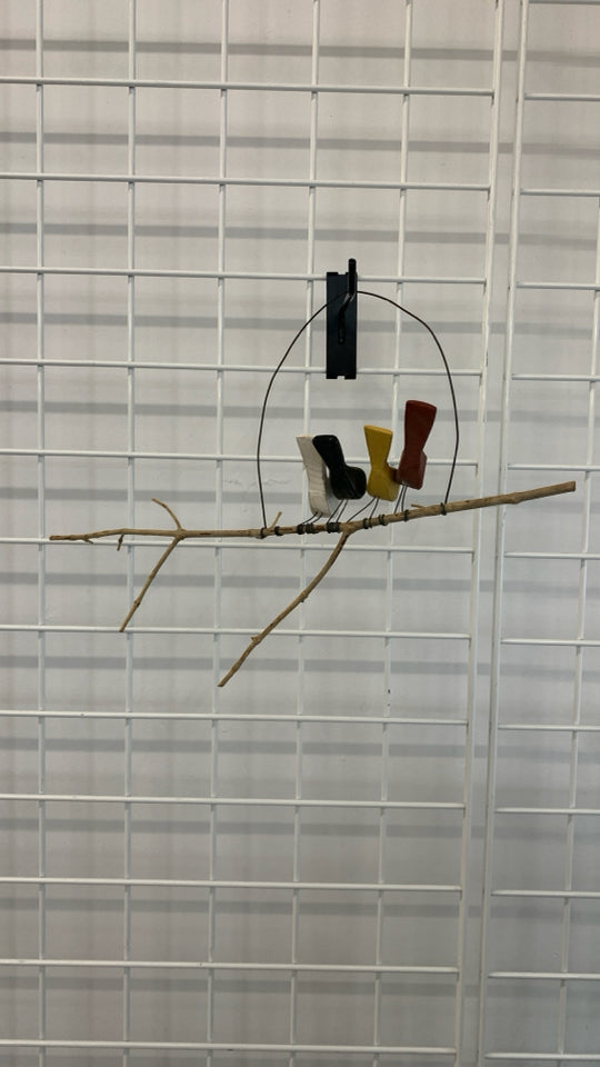 COLORFUL WOOD FISH ON TWIG PRIMITIVE WALL DECOR.