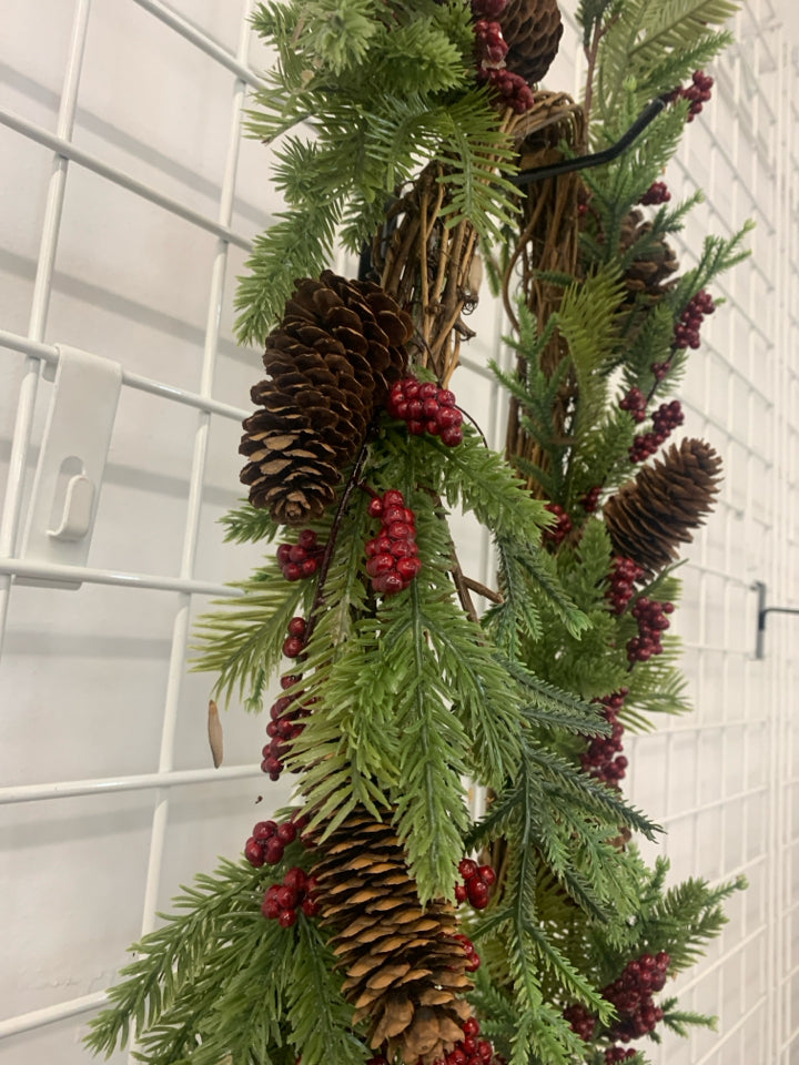 PINECONES AND RED PIP BERRY GARLAND.
