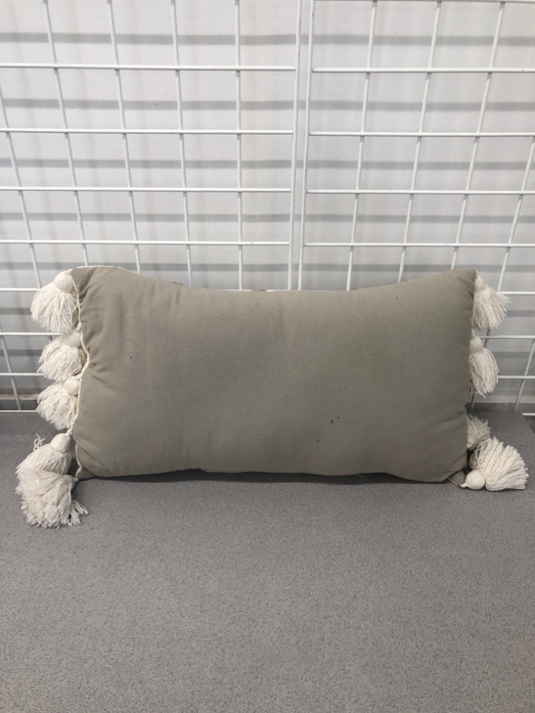 GREY STRIPE PILLOW W/TASSLES AND BRAID DETAIL.