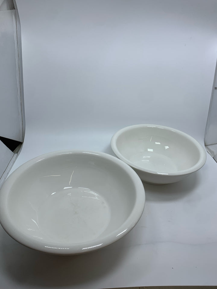4 CERAMIC NESTING BOWLS.