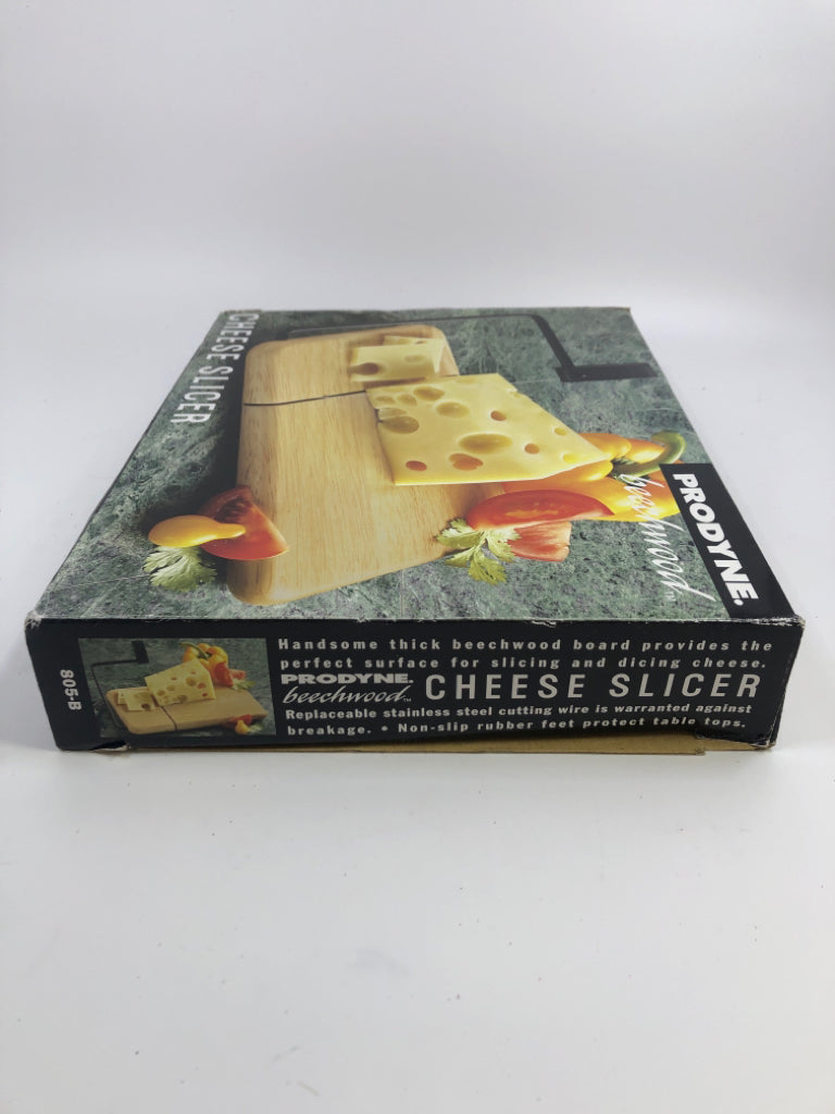 NIB CHEESE SLICER.