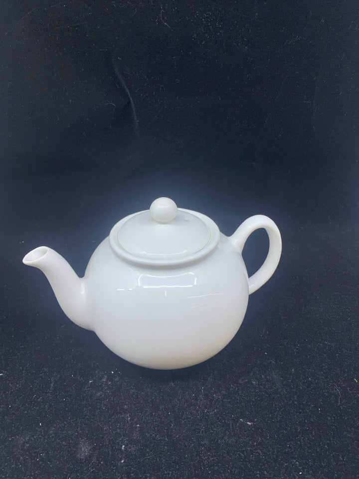 SMALL WHITE TEAPOT.