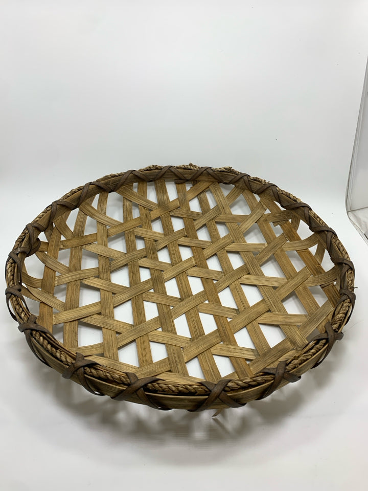 HAND-WOVEN CANE BASKET.