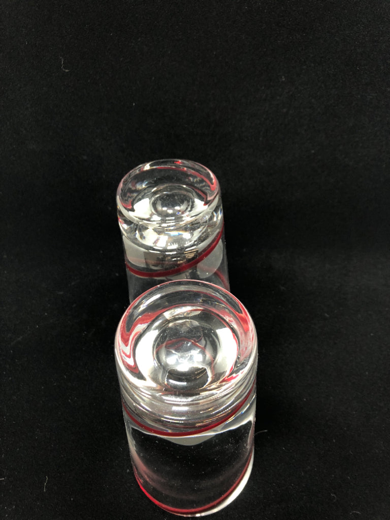 2 RED SWIRL GLASSES.