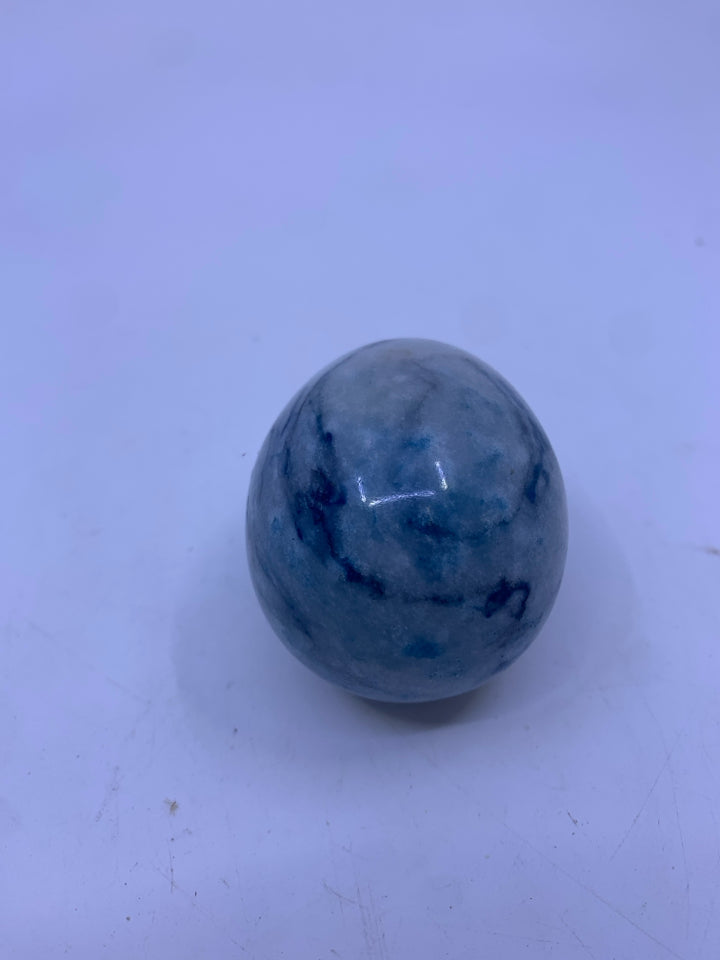 BLUE MARBLED GLASS EGGS.